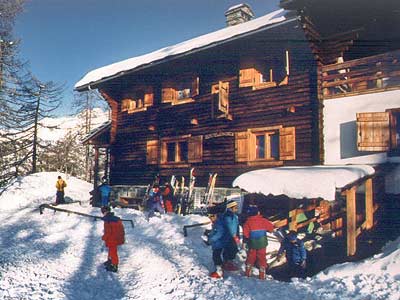 View of the Rifugio L'Ermitage Chamois in winter