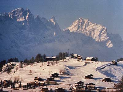 View of Chamois, with the mountains of Valtournenche in the background