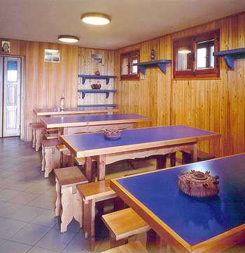 Inner view of the dining room in the Rifugio L'Ermitage
